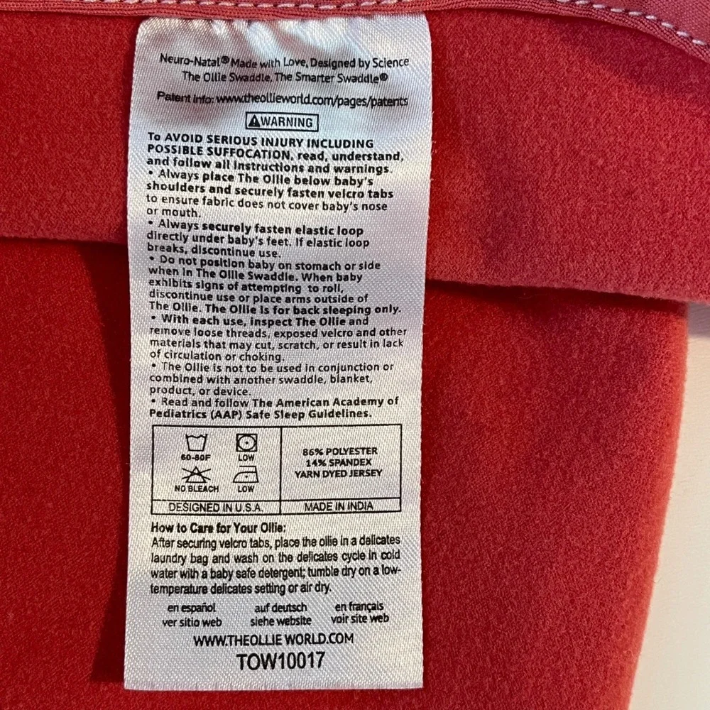 The Ollie‎ Swaddle Coral Pink Adjustable Infant Sleep Wrap